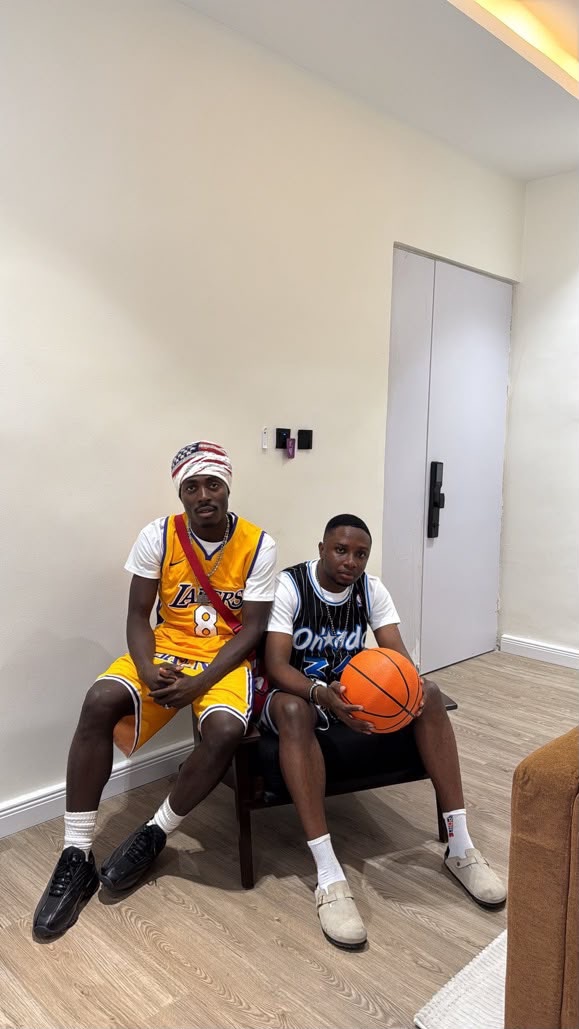 Two customers in Lakers #8 and Orlando #32 jerseys