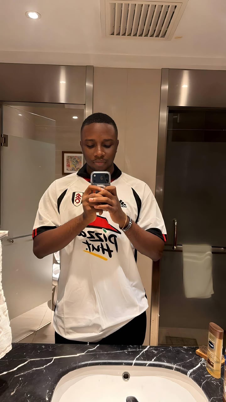 Customer in a Fulham retro jersey